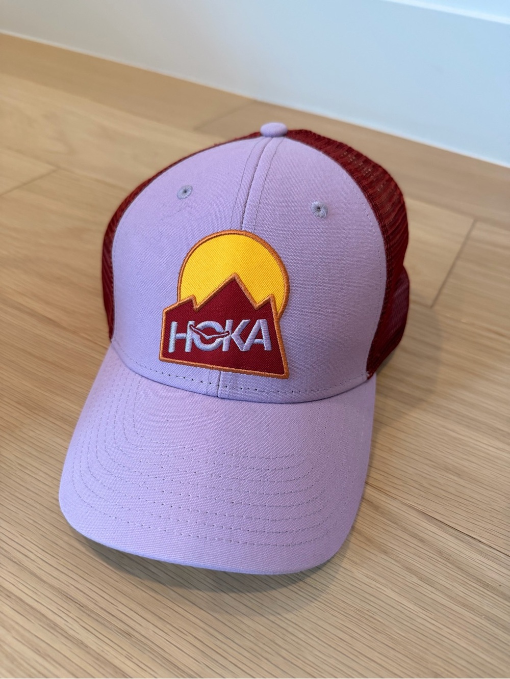 HOKA Lavender Front with Red Mesh & Yellow Logo Trucker Hat